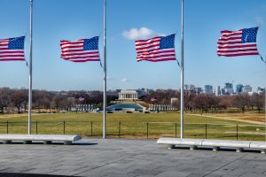 American flags flying at the Lincoln Memorial on 9/11 — symbol of remembrance and prayer in America.